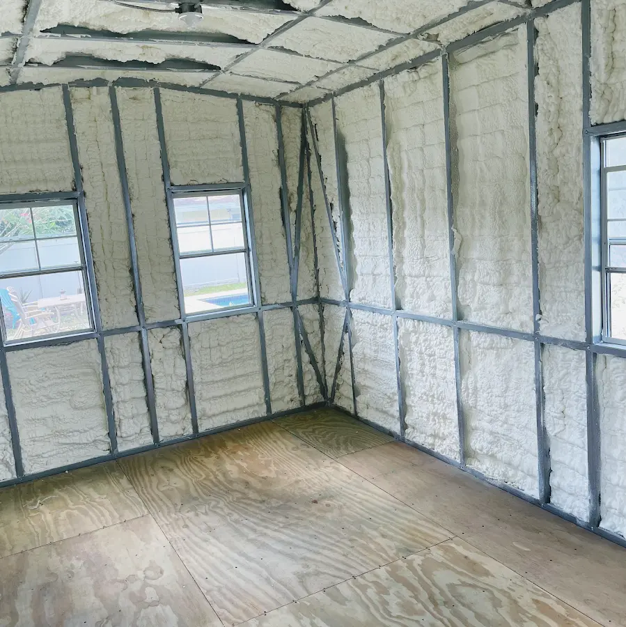 Closed-cell spray foam insulation applied to wall cavities in a residential project in Poulsbo